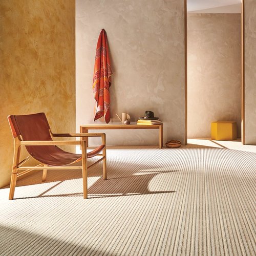 Red chair on the carpet - Mac's Custom Flooring in Redlands