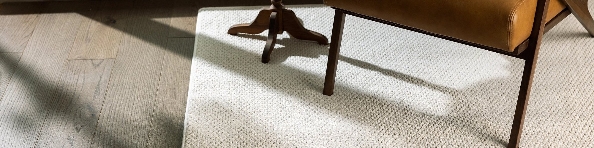 Chair and table on the rug - Mac's Custom Flooring in Redlands