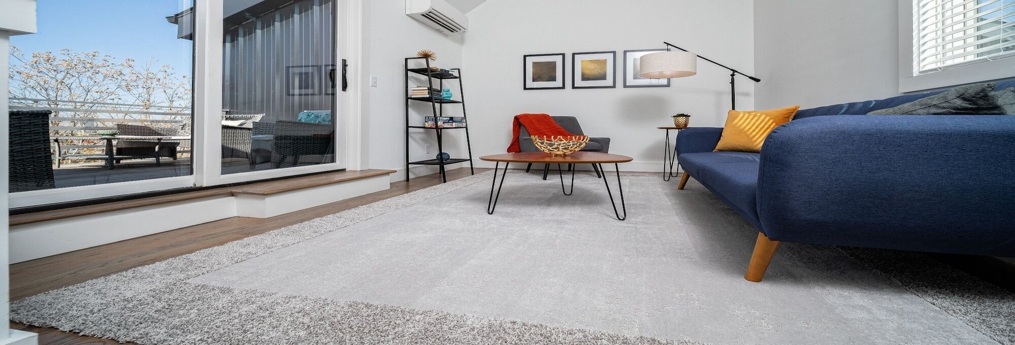 Couch and table on the rug - Mac's Custom Flooring in Redlands